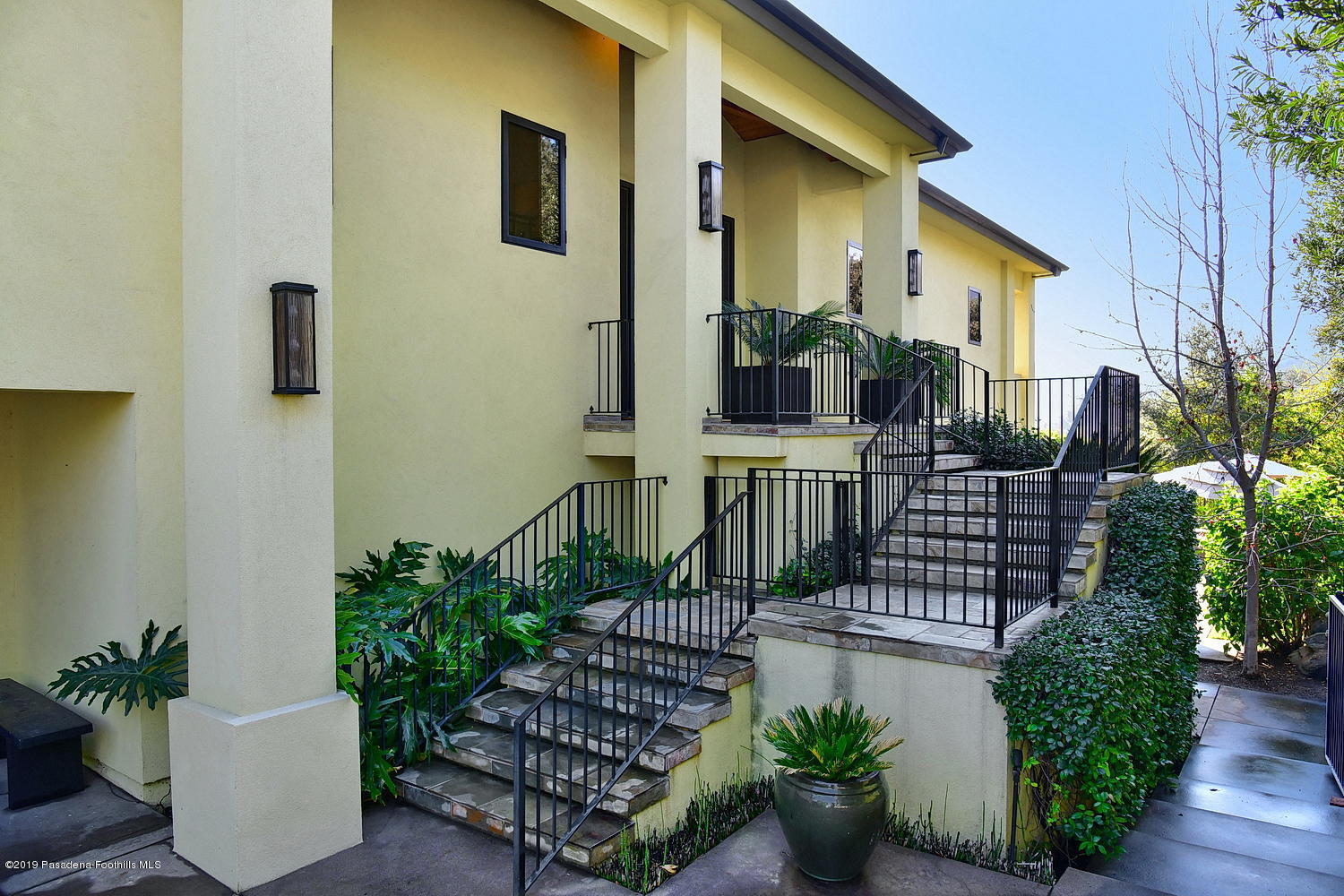 1825 Braemar Road Pasadena, CA 91103 - Photo 3 of 82 a view of a balcony with chairs potted plants