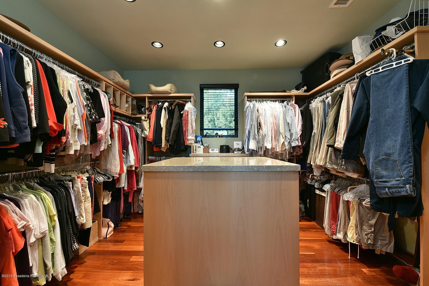 1825 Braemar Road Pasadena, CA 91103 - Photo 35 of 82 a view of walk in closet with clothes and shoes