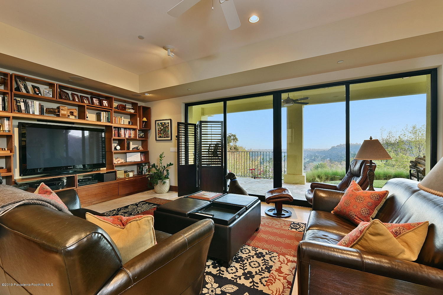 1825 Braemar Road Pasadena, CA 91103 - Photo 38 of 82 a living room with furniture and a flat screen tv