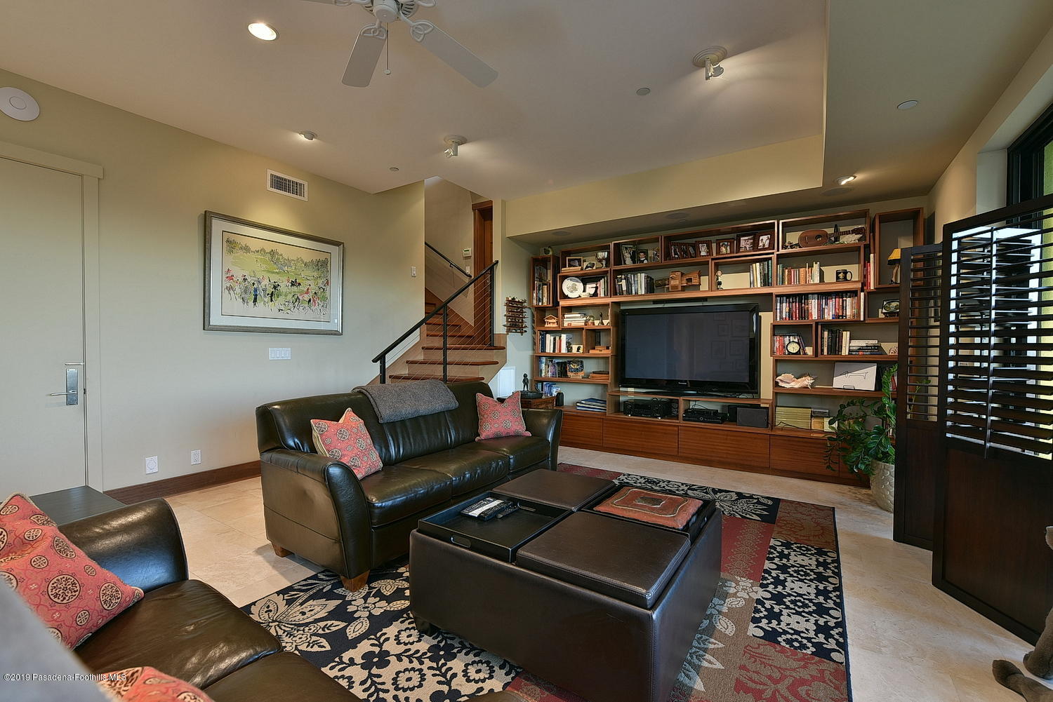 1825 Braemar Road Pasadena, CA 91103 - Photo 39 of 82 a living room with furniture and a flat screen tv