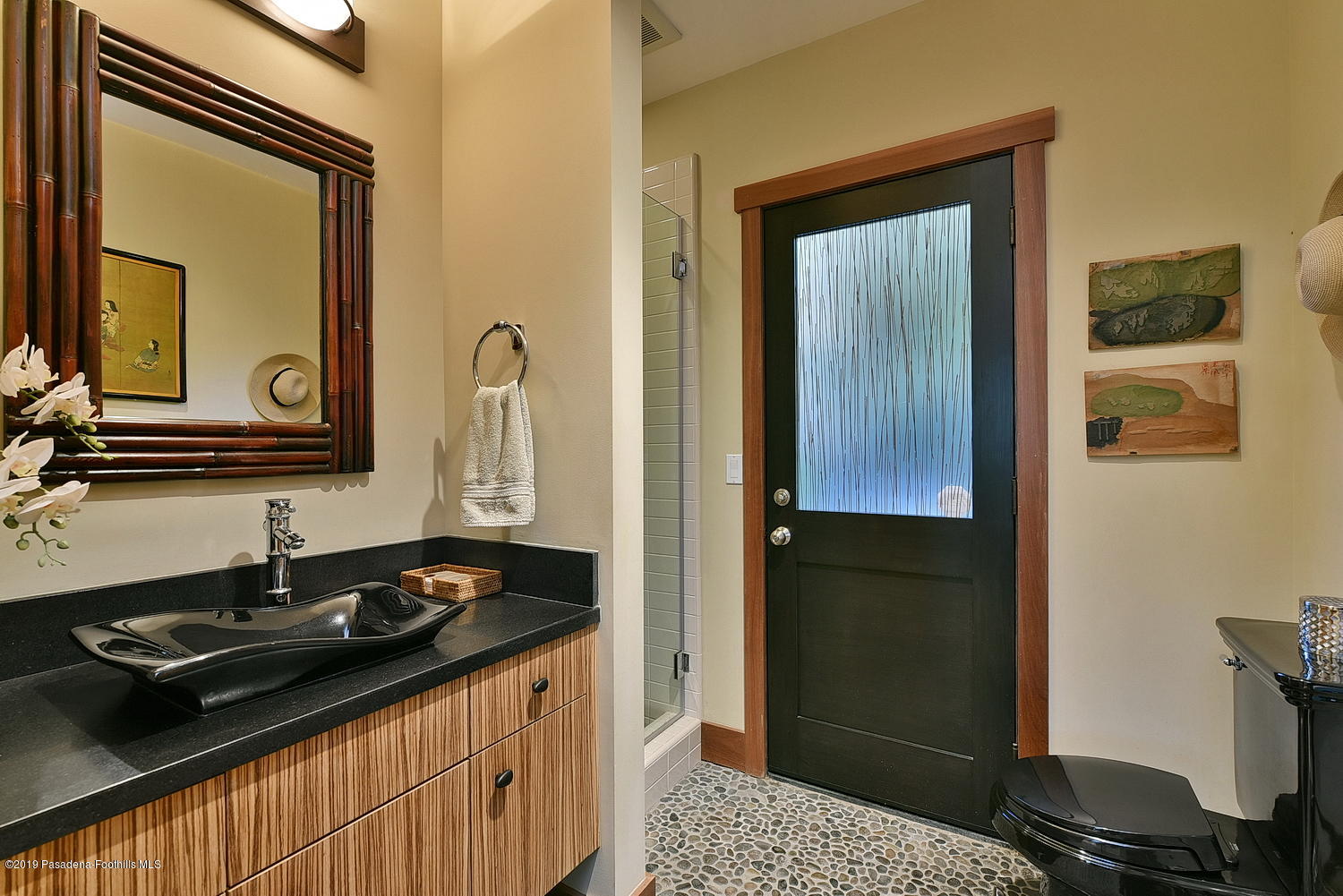 1825 Braemar Road Pasadena, CA 91103 - Photo 41 of 82 a bathroom with a sink and a mirror