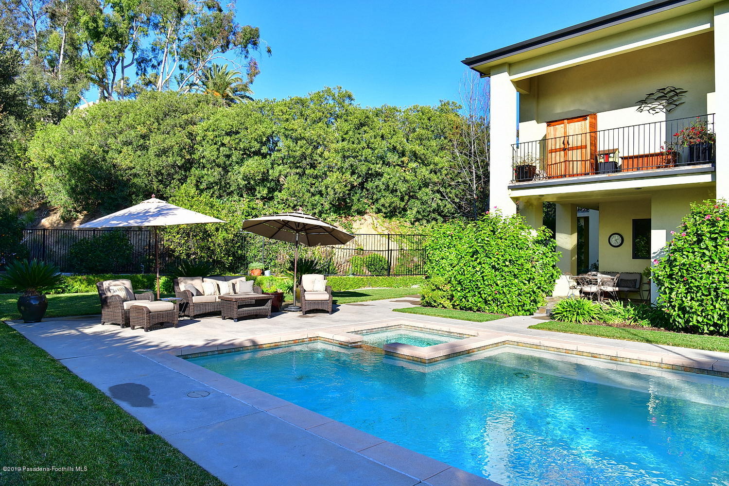 1825 Braemar Road Pasadena, CA 91103 - Photo 48 of 82 a view of a chair and table in the backyard of the house
