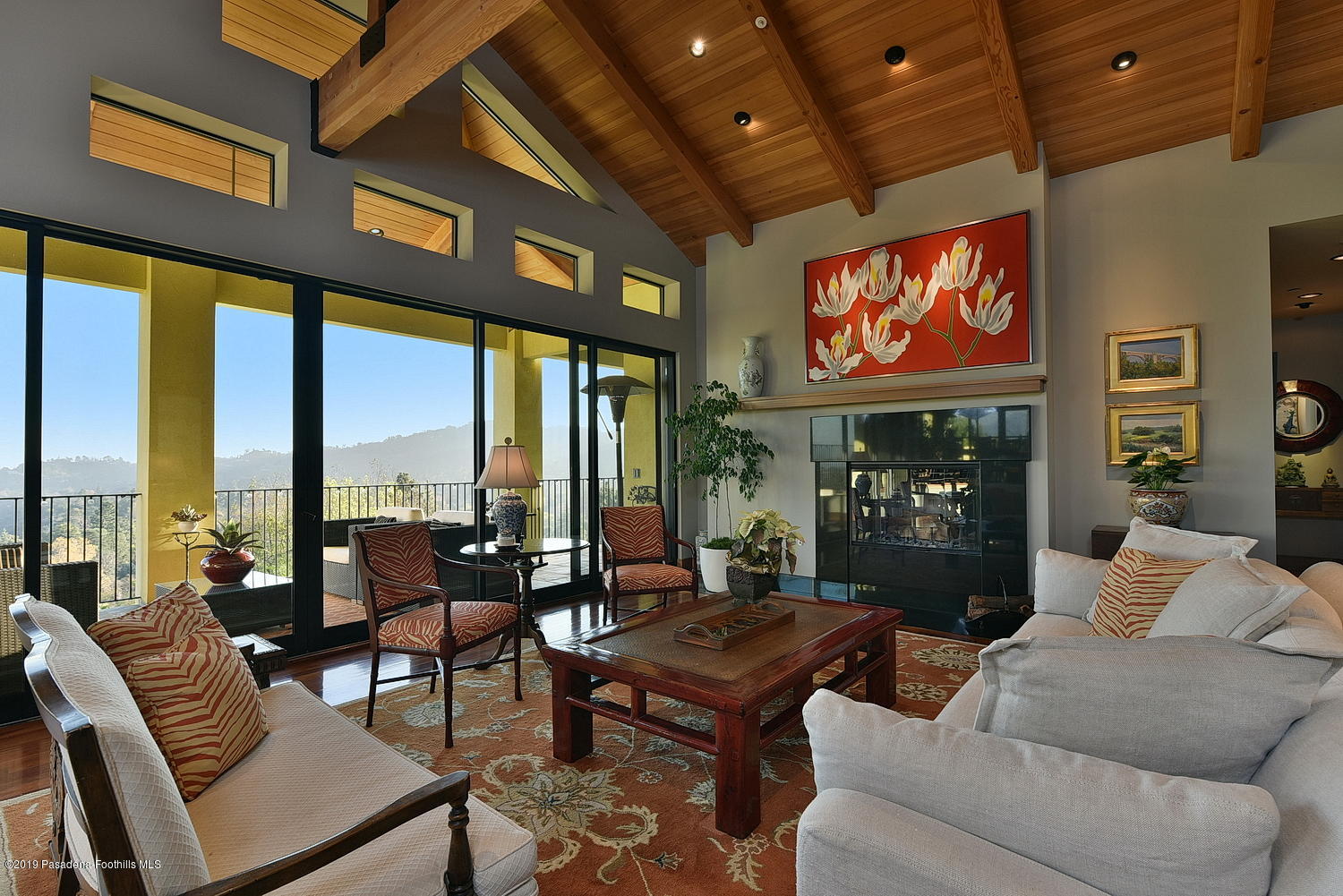 1825 Braemar Road Pasadena, CA 91103 - Photo 8 of 82 a living room with furniture a fireplace and floor to ceiling windows