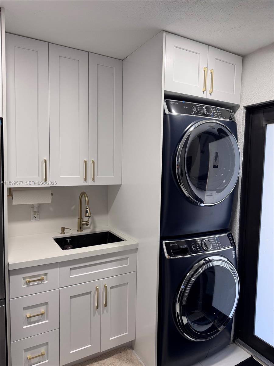 26711 Southwest 145th Avenue Road Homestead, FL 33032 - Photo 14 of 21 a kitchen with a washer and dryer