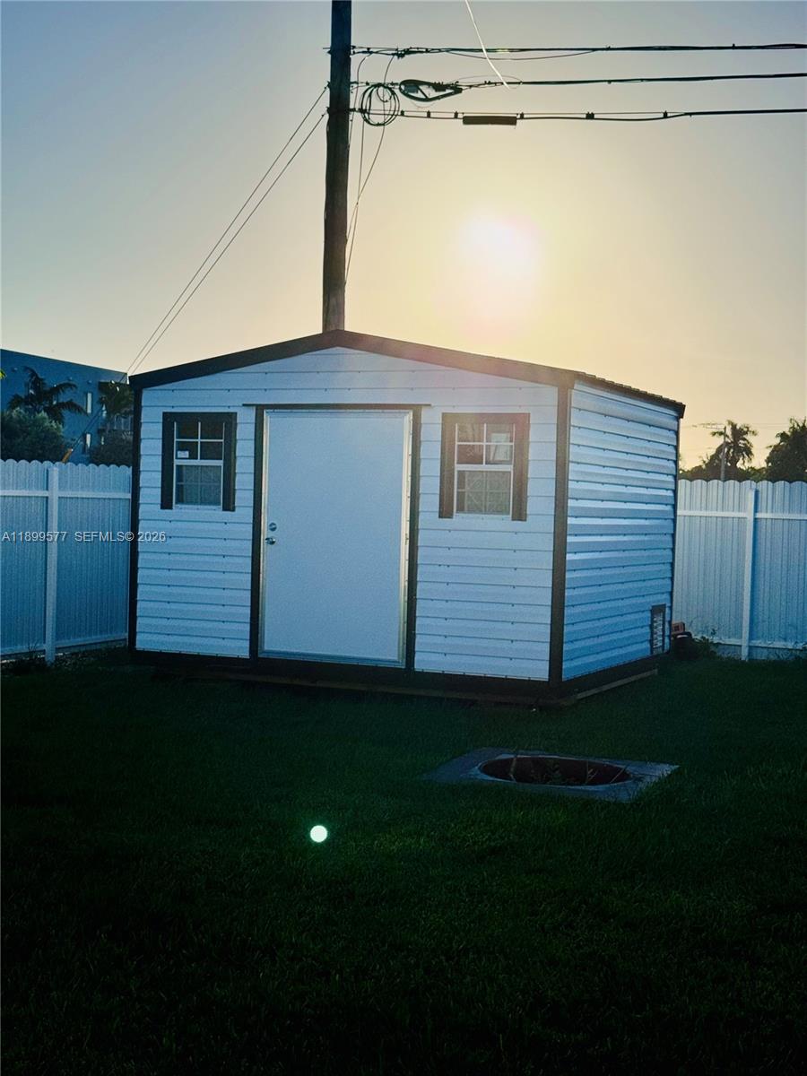 26711 Southwest 145th Avenue Road Homestead, FL 33032 - Photo 18 of 21 a view of a backyard of the house