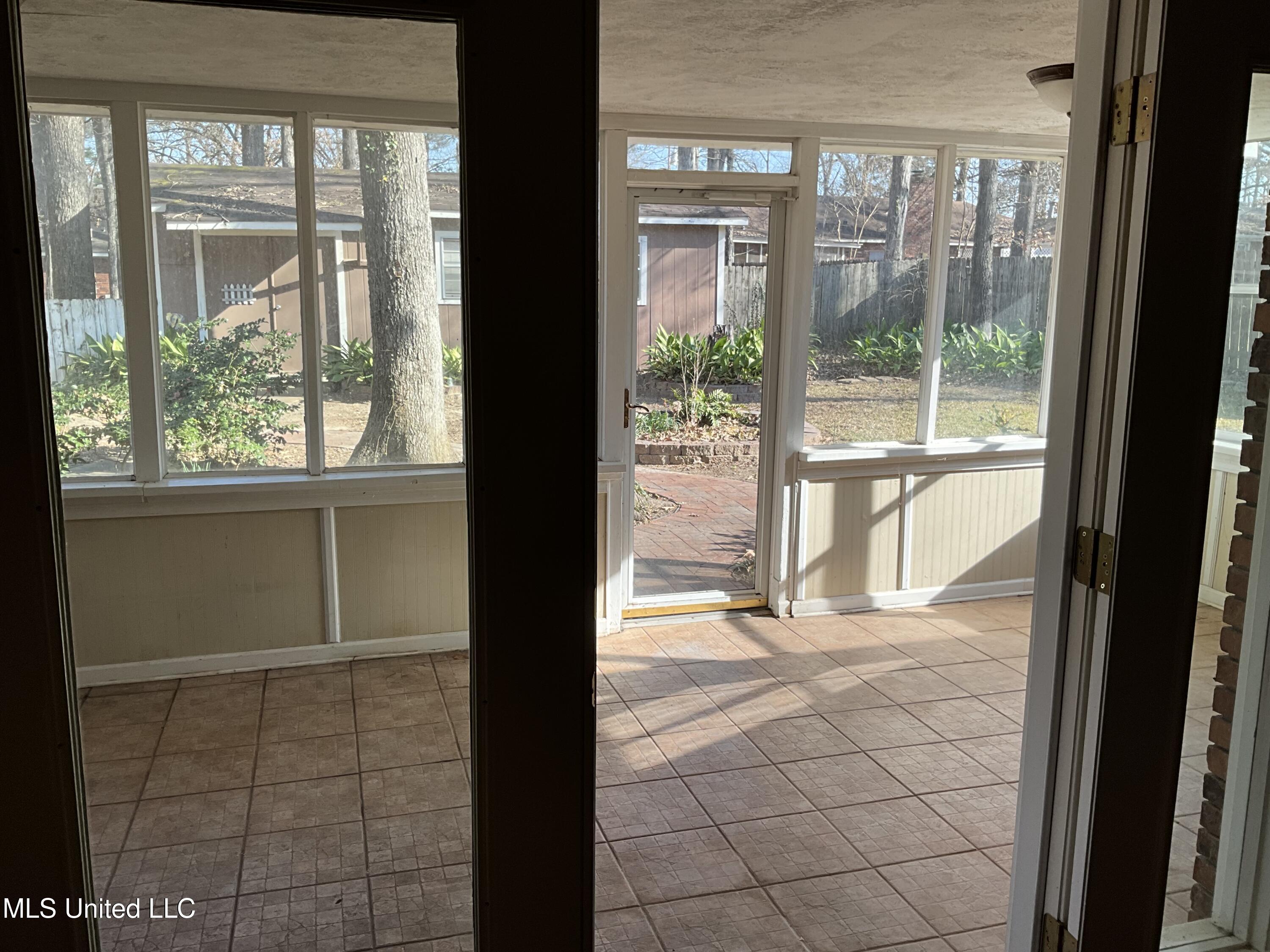 1409 Post Road Clinton, MS 39056 - Photo 26 of 34 1409 Post Screened Porch 2