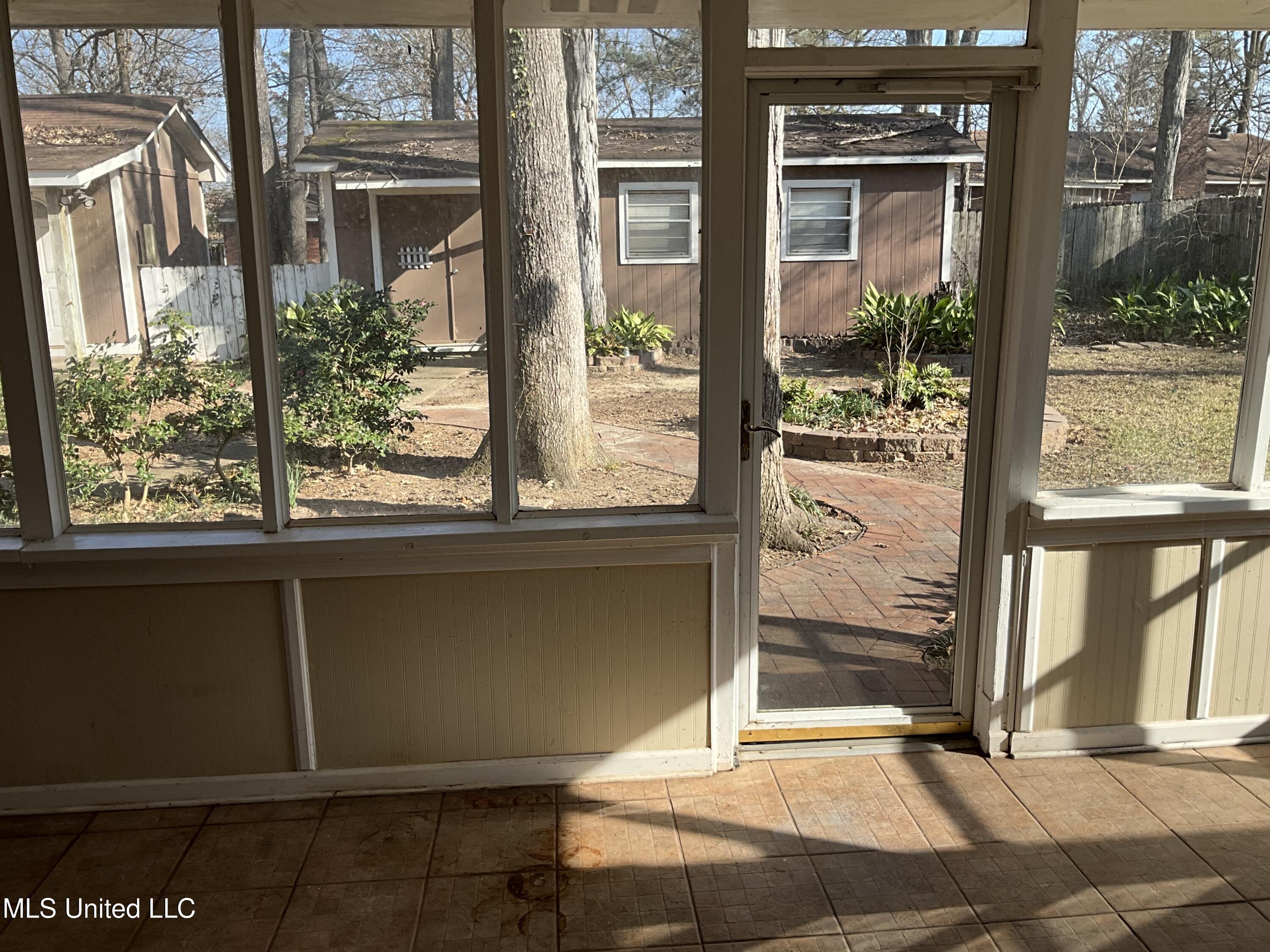 1409 Post Road Clinton, MS 39056 - Photo 27 of 34 1409 Post Screened Porch