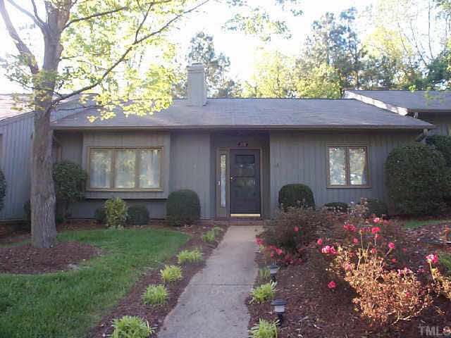 728 Red Forest Trail Raleigh, NC 27615 - Photo 1 of 8 a front view of a house with garden