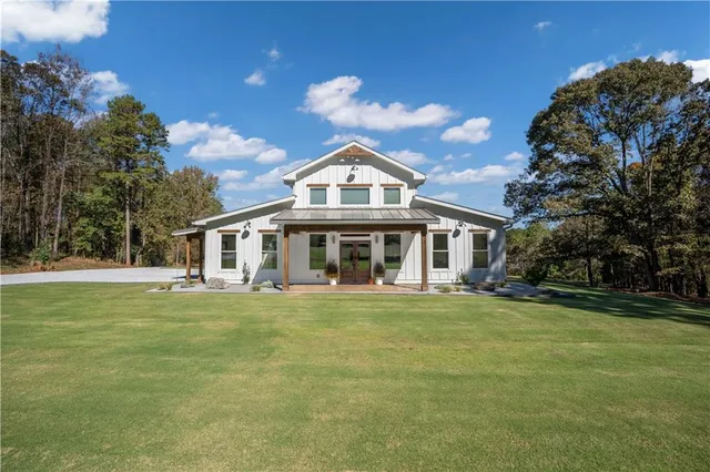 an aerial view of a house with a garden