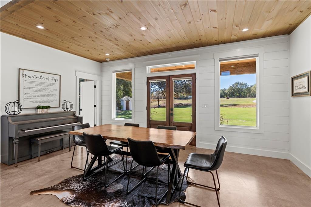 196 Frank Brown Road Maysville, GA 30558 - Photo 33 of 66 a dining room with furniture and window