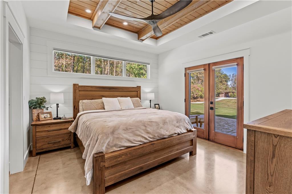 196 Frank Brown Road Maysville, GA 30558 - Photo 48 of 66 a bed room with a bed and a window