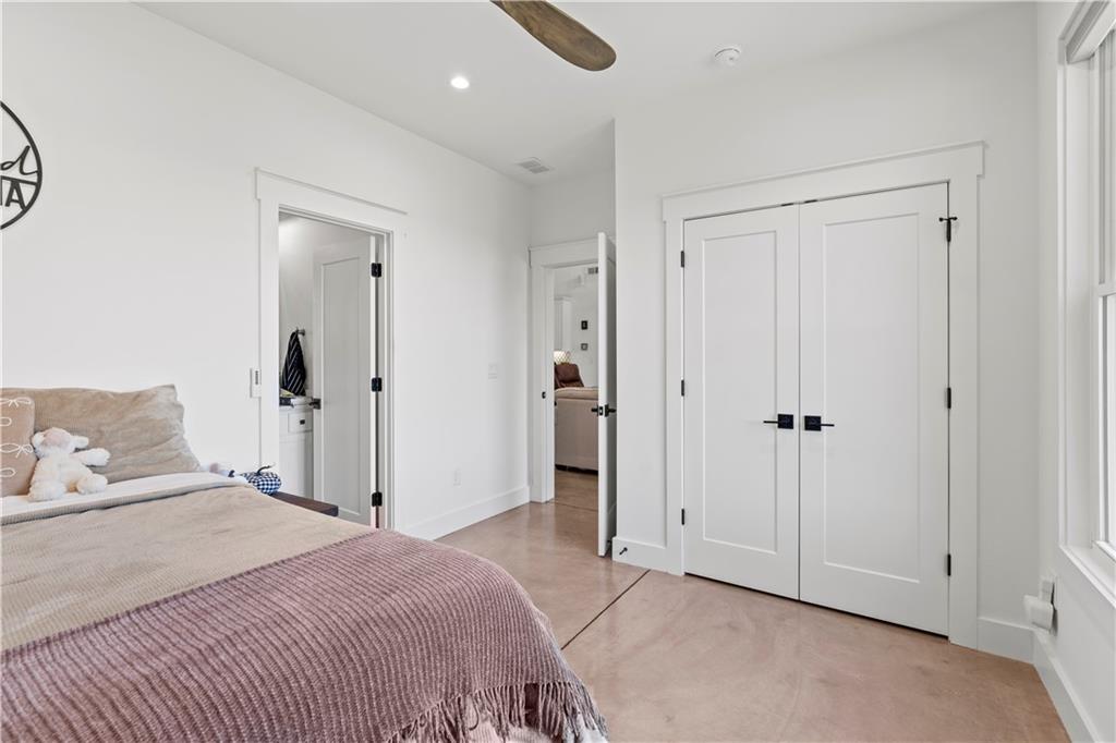 196 Frank Brown Road Maysville, GA 30558 - Photo 53 of 66 a bedroom with a bed and a closet