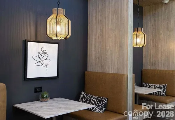 an aerial view of a house with a big yard