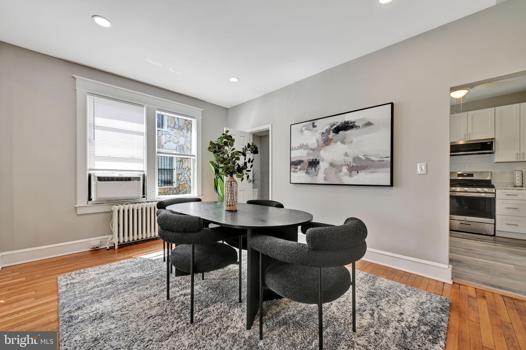 3005 7th Street Southeast Washington, DC 20032 - Photo 13 of 56 a dining room with furniture and window