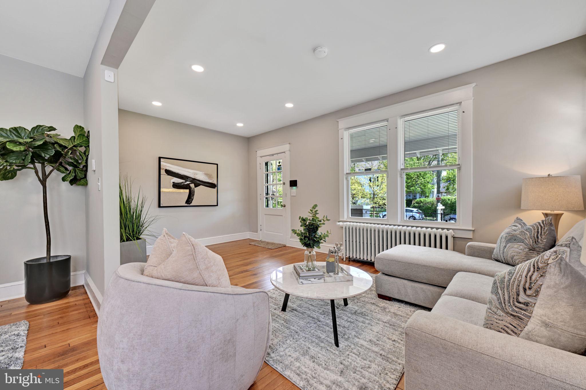 3005 7th Street Southeast Washington, DC 20032 - Photo 2 of 56 a living room with furniture and a large window