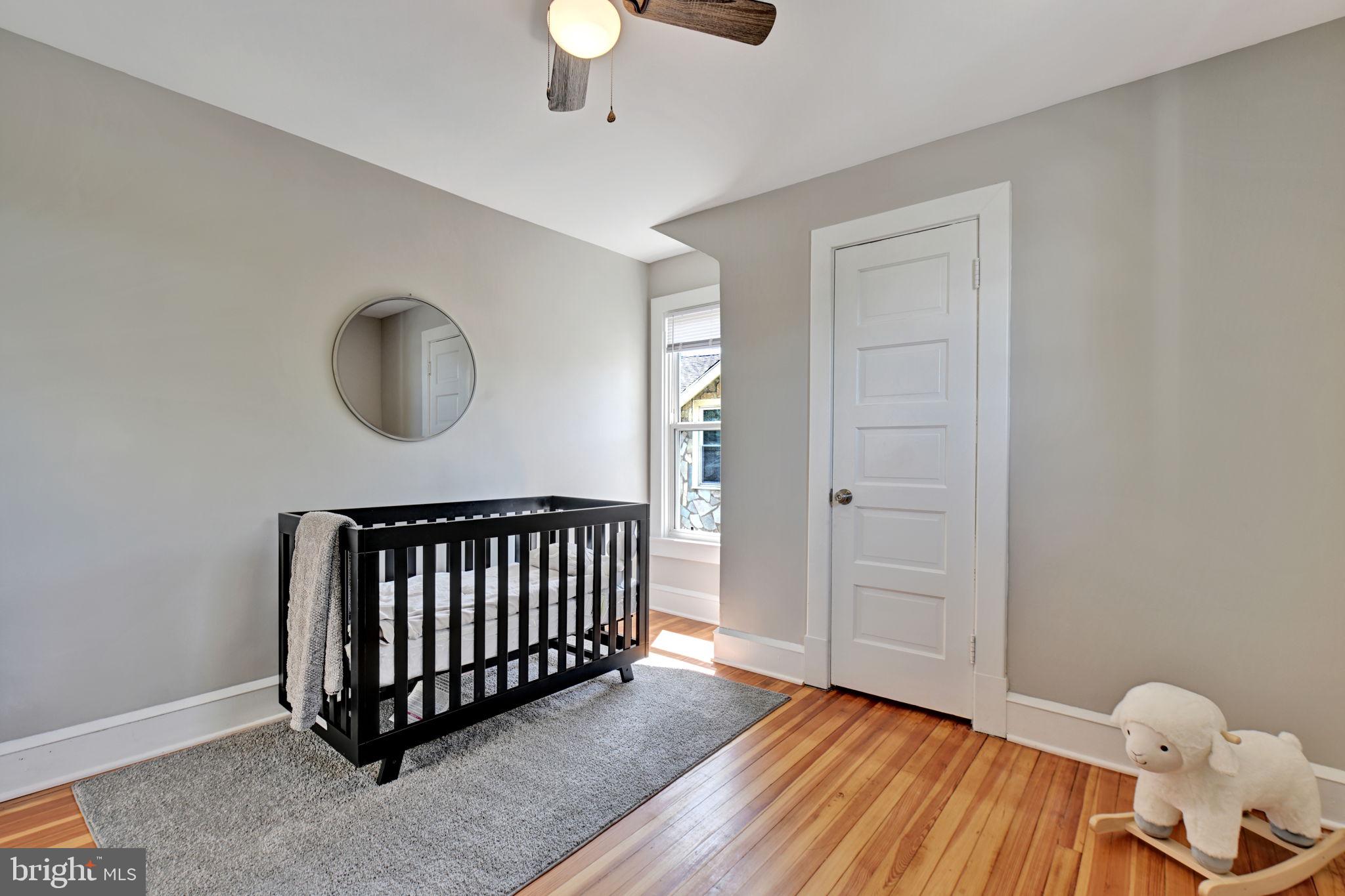 3005 7th Street Southeast Washington, DC 20032 - Photo 30 of 56 a view of a livingroom with wooden floor and a bathroom