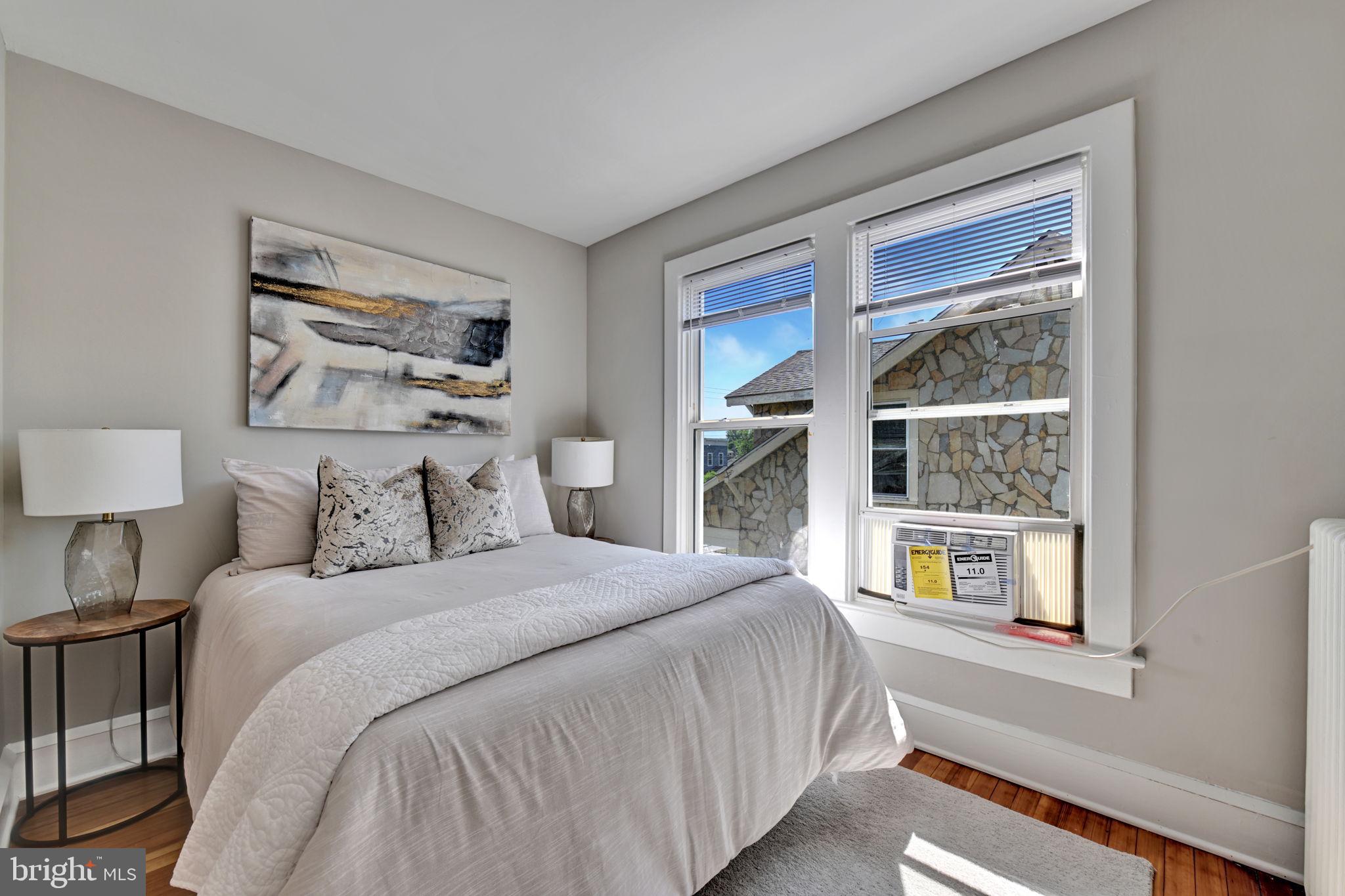 3005 7th Street Southeast Washington, DC 20032 - Photo 33 of 56 a bedroom with a bed and a window