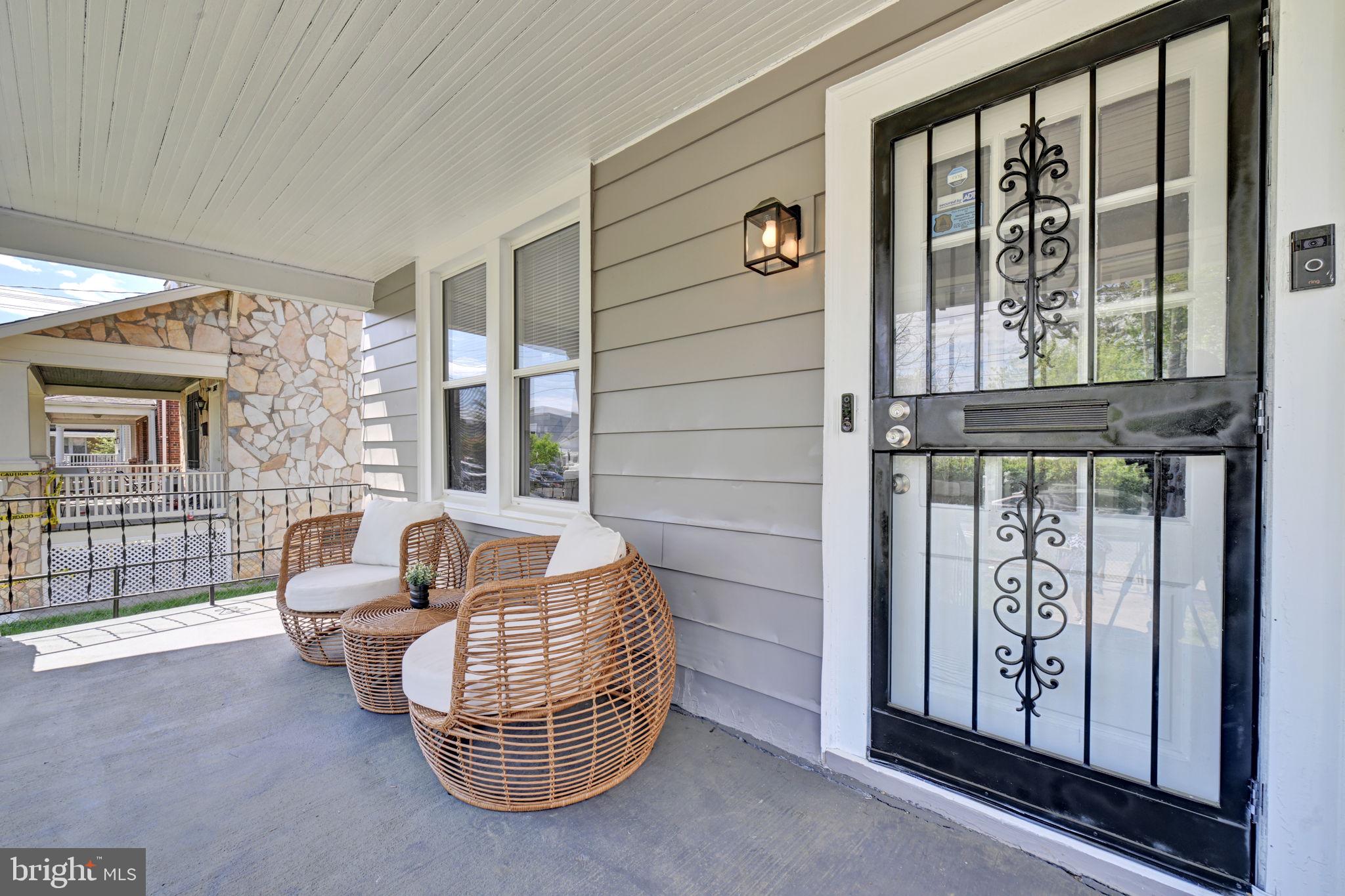 3005 7th Street Southeast Washington, DC 20032 - Photo 45 of 56 a living room with furniture and large windows