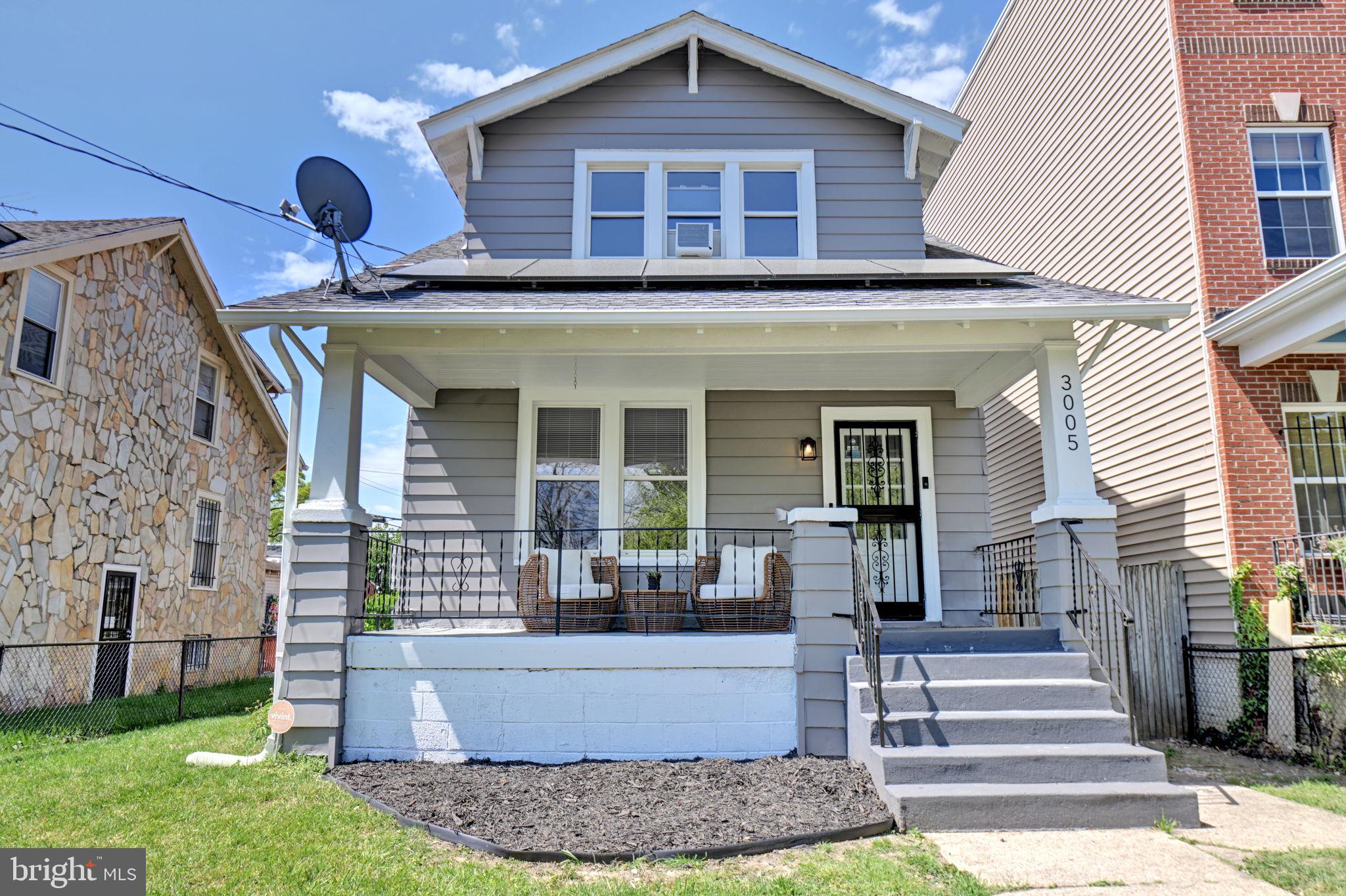 3005 7th Street Southeast Washington, DC 20032 - Photo 46 of 56 a front view of a house with a yard