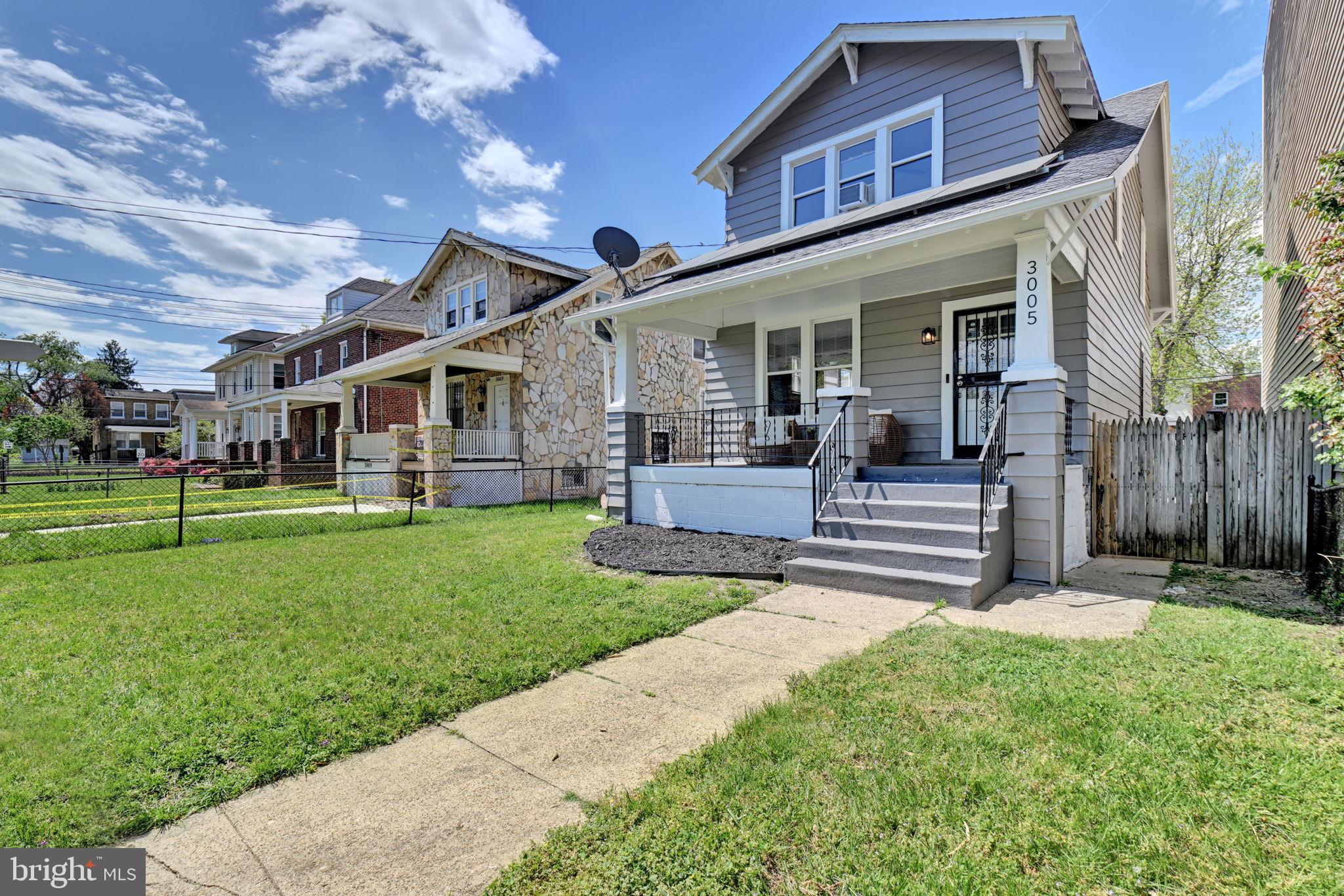 3005 7th Street Southeast Washington, DC 20032 - Photo 49 of 56 a view of a house with a yard and sitting area