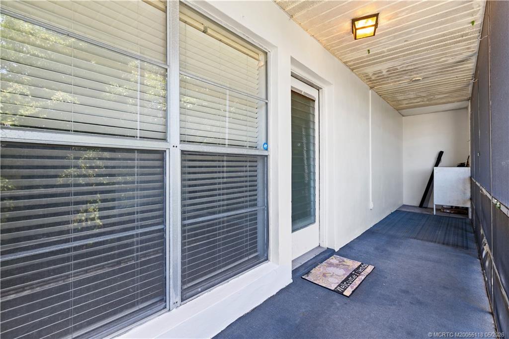 2118 Southeast Edler Drive, Unit B Stuart, FL 34994 - Photo 18 of 20 a view of backyard with furniture