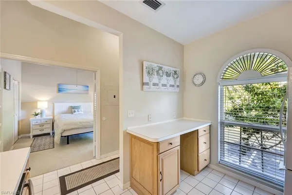 a view of a kitchen cabinets and wooden floor