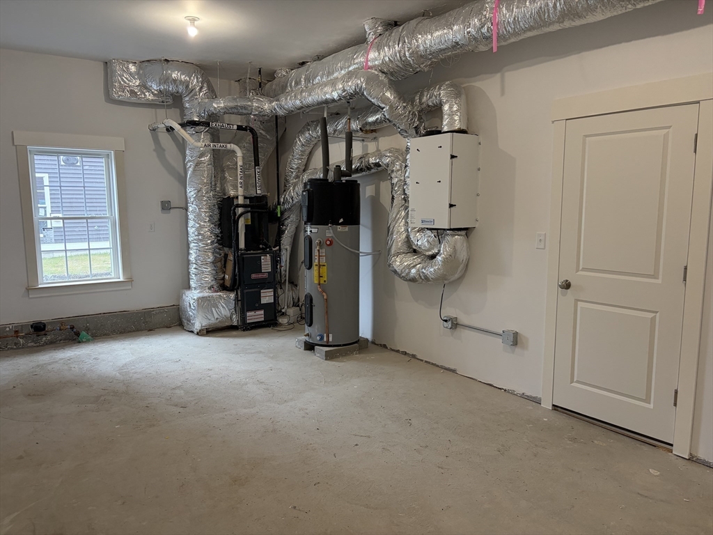 76 Valmor Street Worcester, MA 01604 - Photo 5 of 20 a view of a room with gym equipment