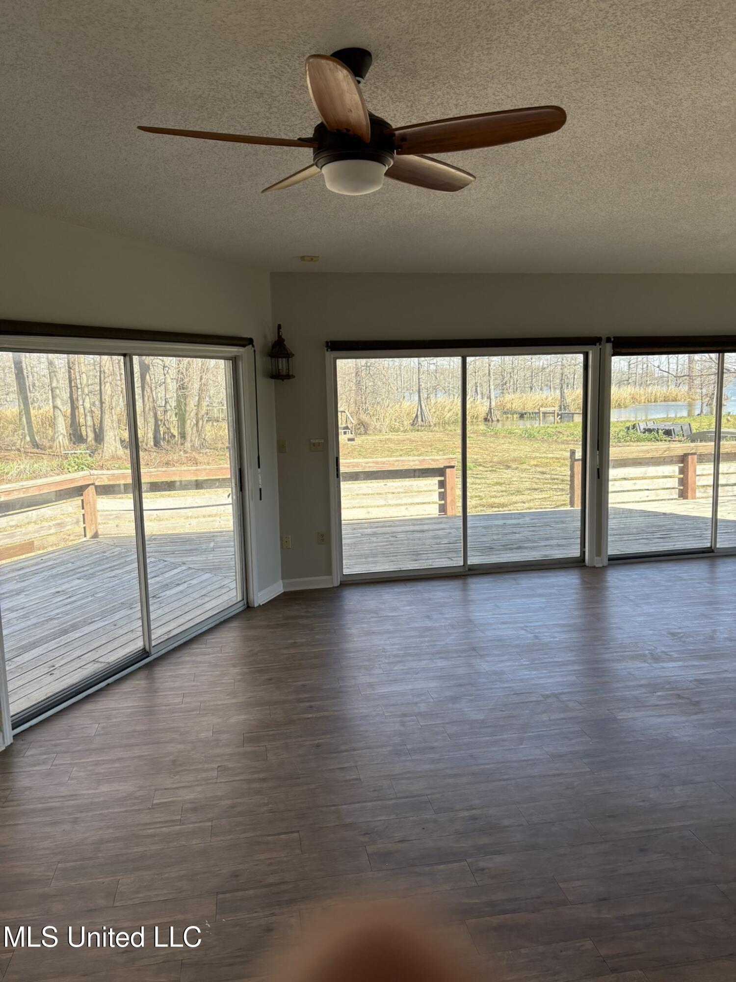 331 Lake Washington Road East Glen Allan, MS 38744 - Photo 9 of 24 LW 331 Den View Side