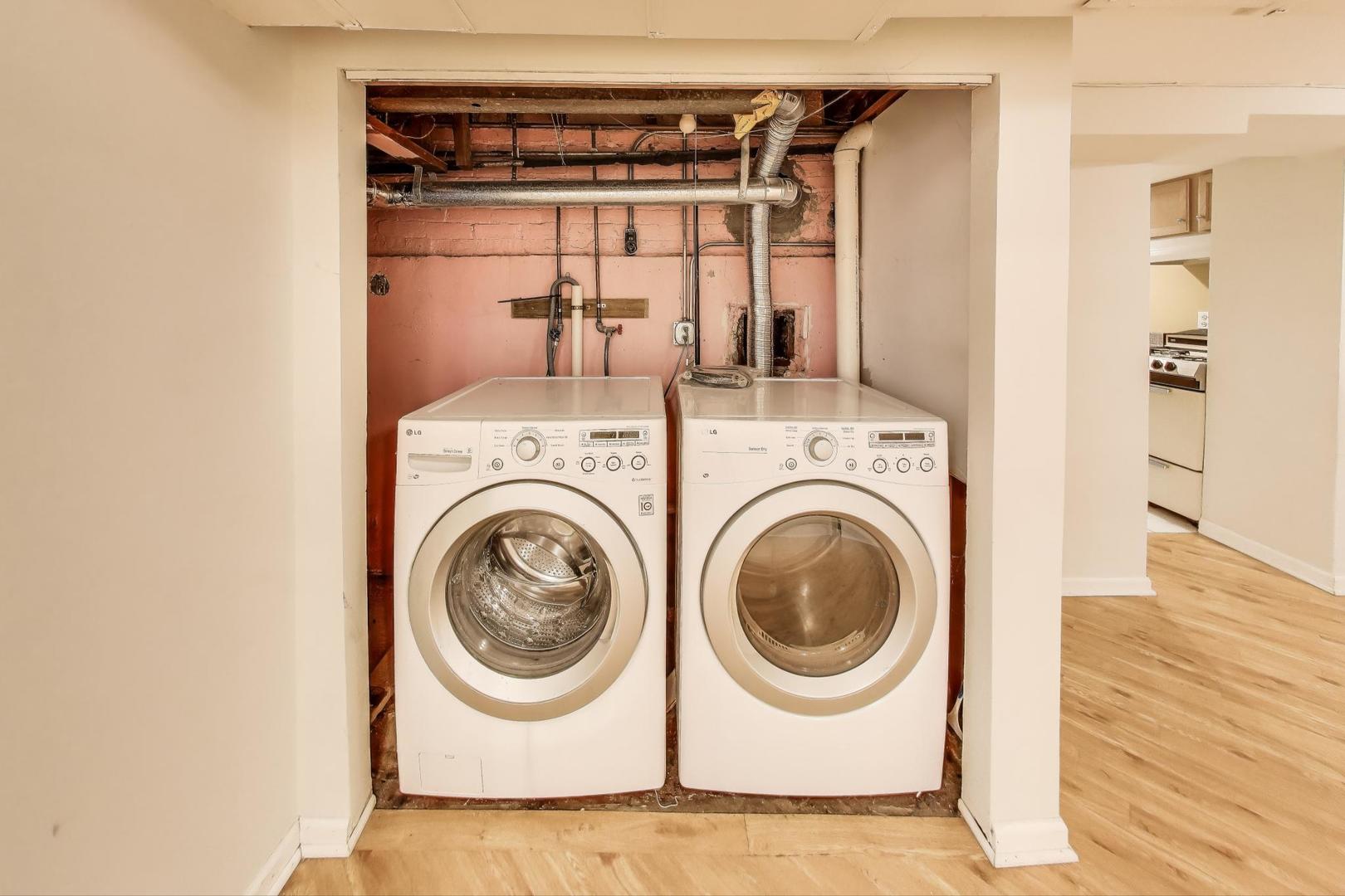 7401 West Main Street Niles, IL 60714 - Photo 29 of 37 a utility room with dryer and washer
