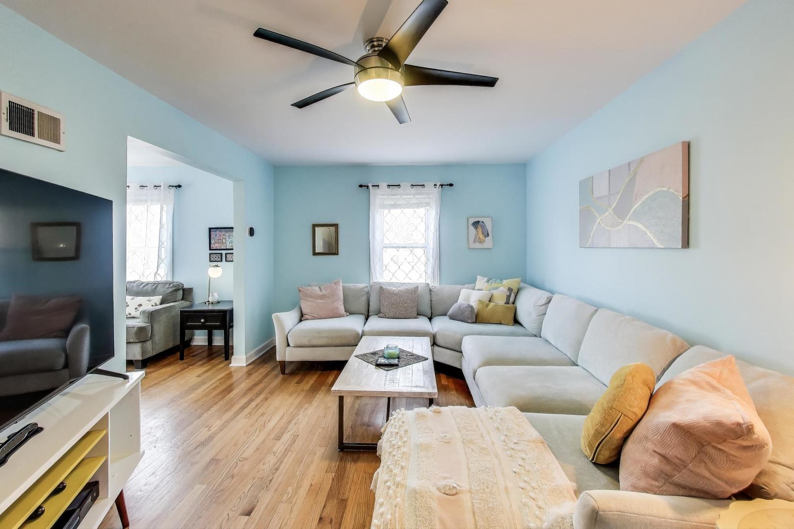 7401 West Main Street Niles, IL 60714 - Photo 8 of 37 a living room with furniture and a wooden floor