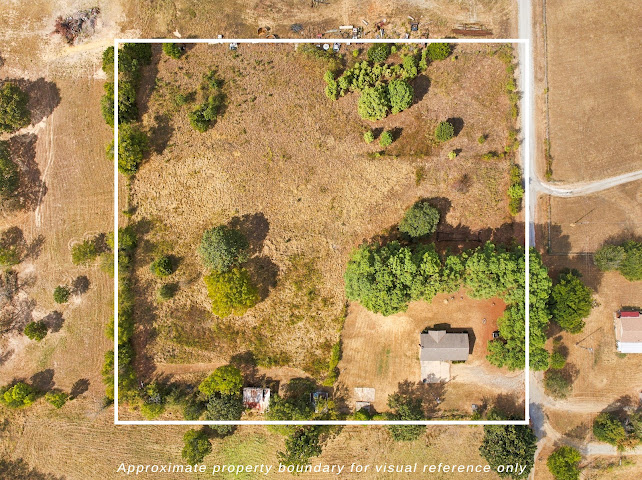 30063 South 4300th Road Stigler, OK 74462 - Photo 44 of 58 Expansive parcel featuring a single-story dwelling, mature trees, and a gravel driveway