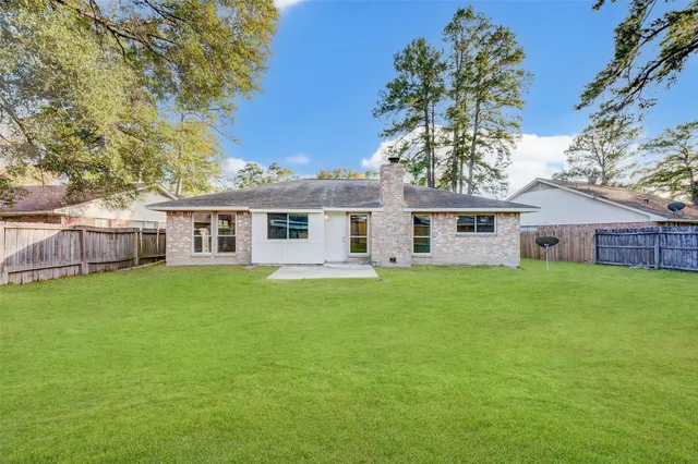 a front view of a house with a garden and porch