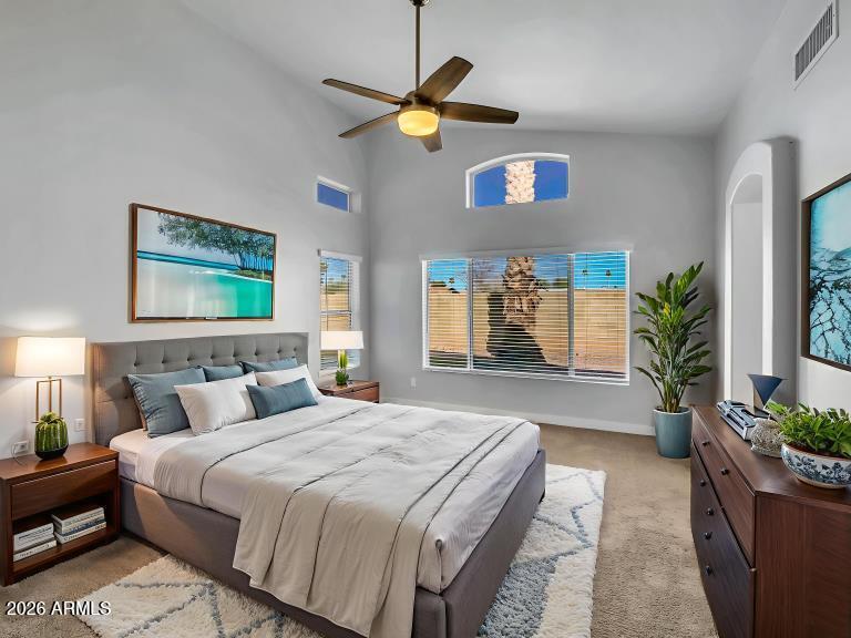 13402 East Boston Street Chandler, AZ 85225 - Photo 4 of 19 a bedroom with a bed and a potted plant
