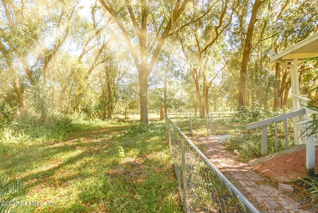 a view of a backyard with a garden