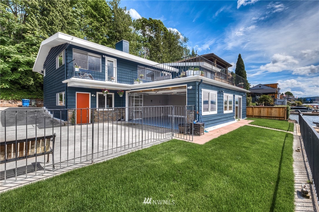 6417 Ripley Ln S East Renton, WA 98056 - Photo 2 of 39 a front view of a house with a yard