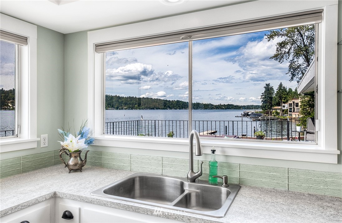 6417 Ripley Ln S East Renton, WA 98056 - Photo 15 of 39 a room with a large window and table