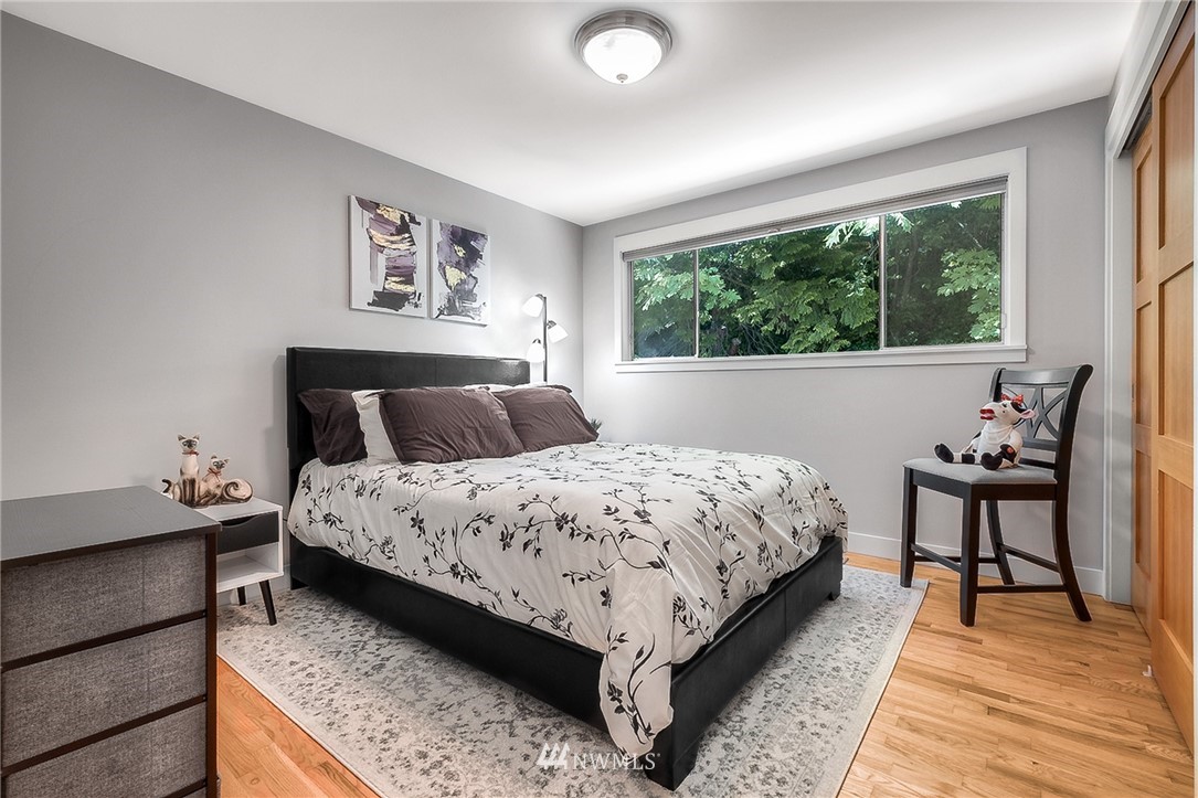 6417 Ripley Ln S East Renton, WA 98056 - Photo 8 of 39 a bedroom with a bed and a window