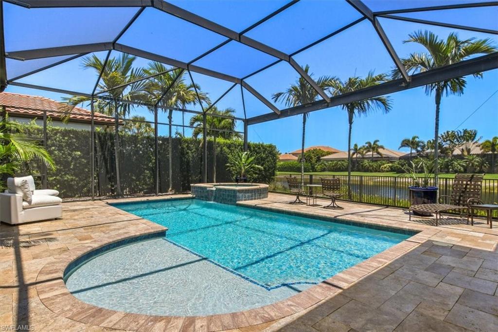 2220 Residence Circle Naples, FL 34105 - Photo 30 of 50 a view of a swimming pool with a patio
