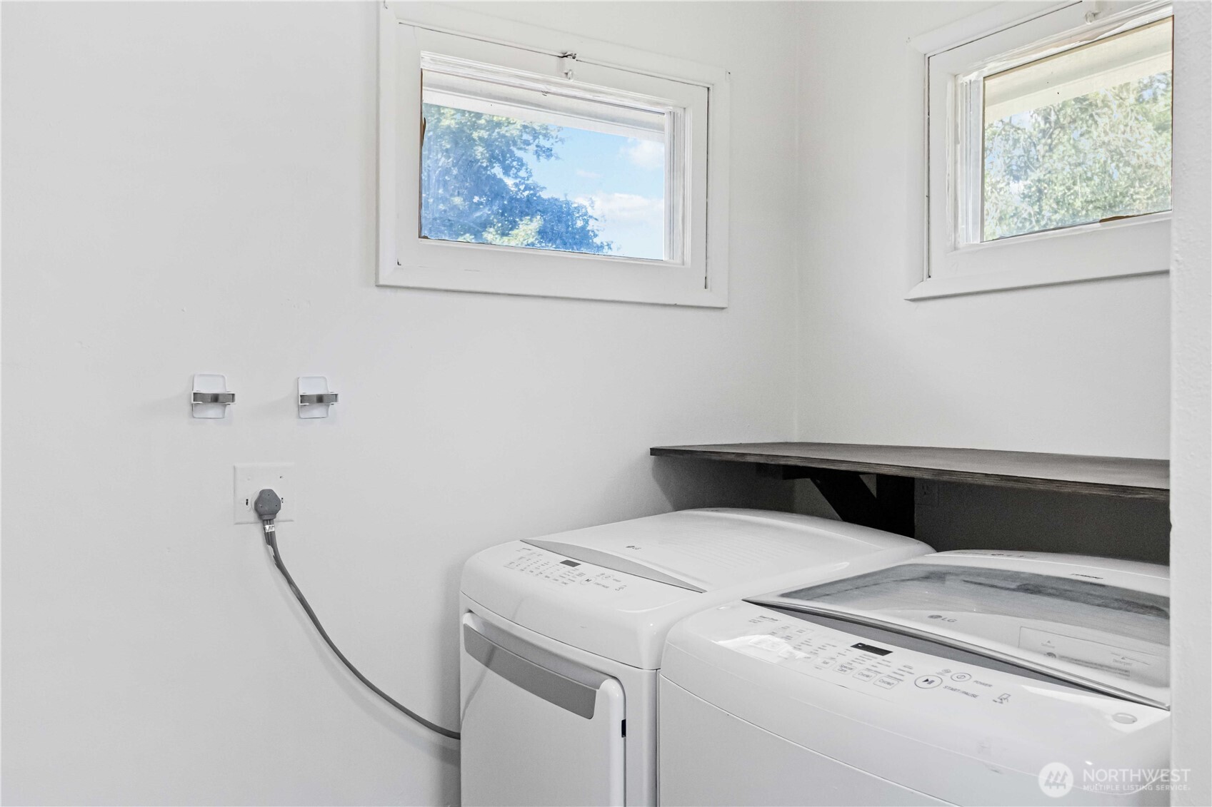 753 Southeast Sumner Street Camas, WA 98607 - Photo 23 of 37 a utility room with dryer and washer