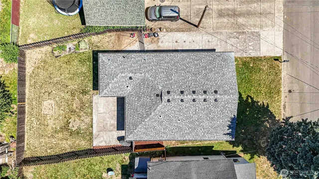 an aerial view of houses with outdoor space