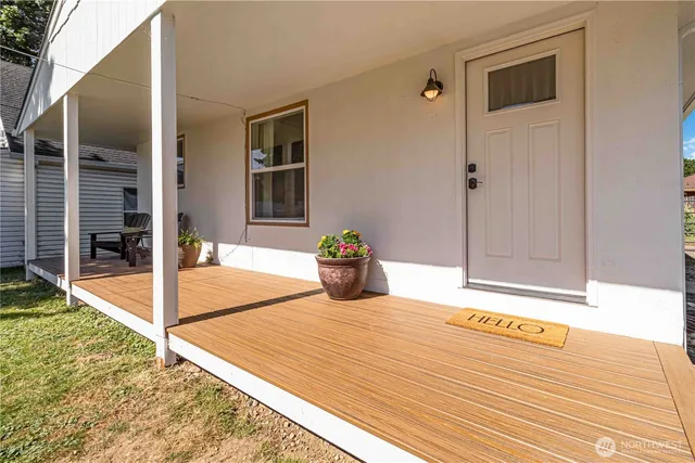 a room with a bed and a chandelier
