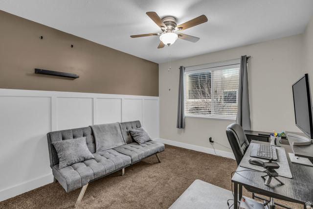 905 South Main Street, Unit G Layton, UT 84041 - Photo 14 of 36 Office area featuring a decorative wall, a wainscoted wall, carpet flooring, and a ceiling fan