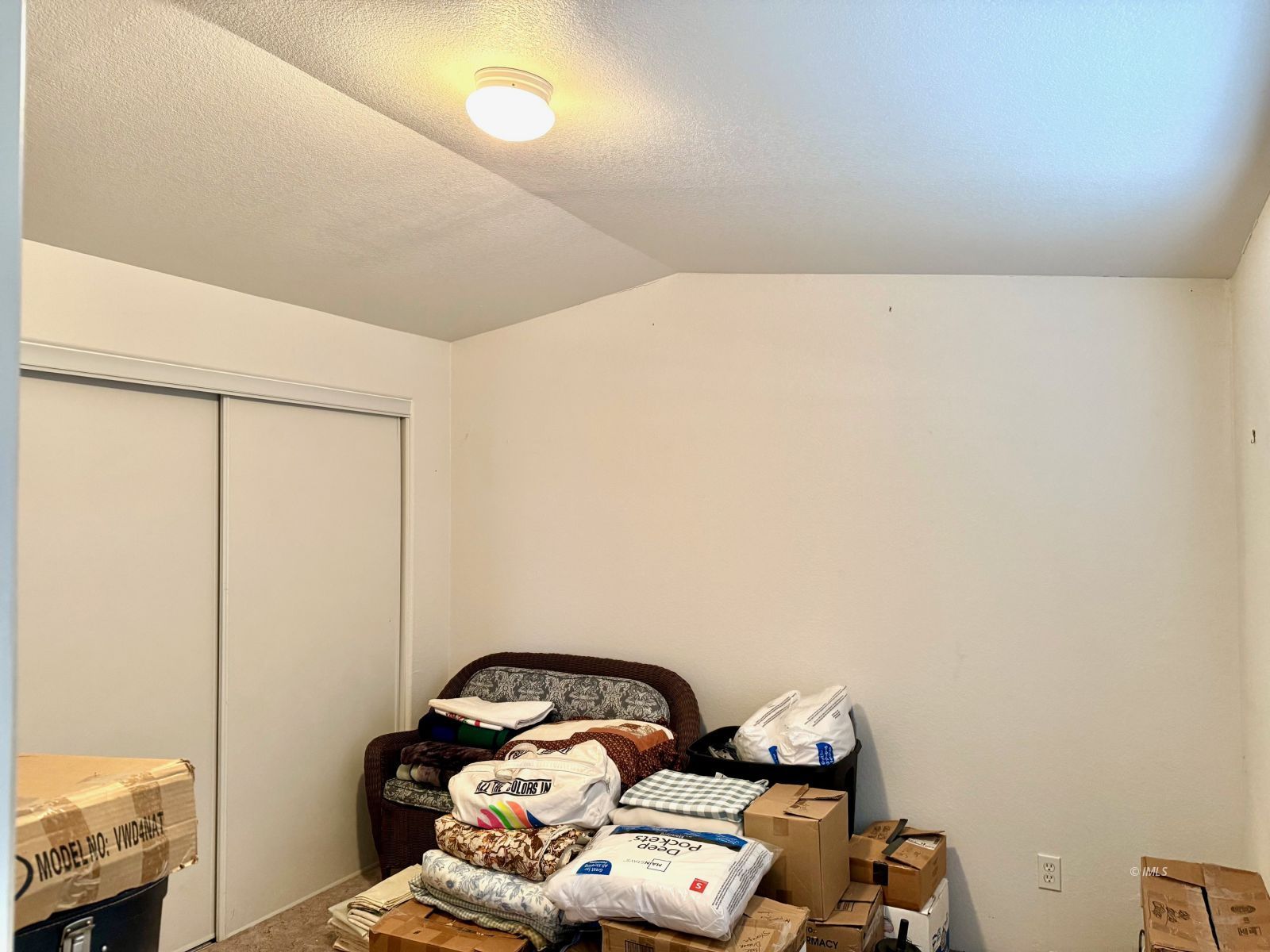 464 Bartell Road, Unit 19 Big Pine, CA 93513 - Photo 6 of 8 a room with a wooden floor and a table