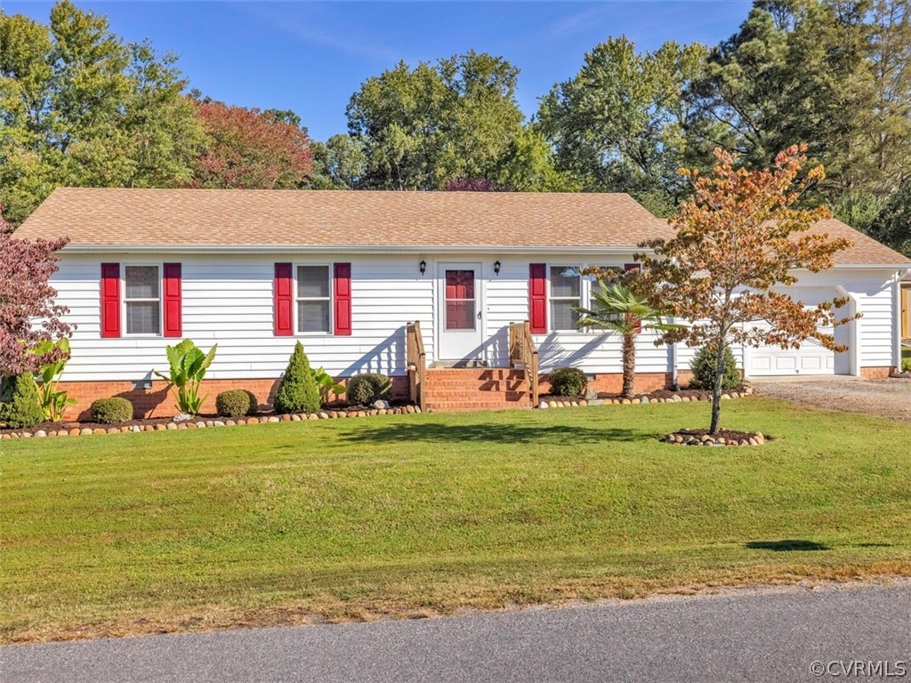 12020 Gardengate Road Midlothian, VA 23112 - Photo 1 of 25 a view of a house with a yard and lake view