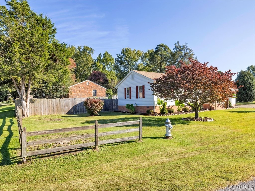 12020 Gardengate Road Midlothian, VA 23112 - Photo 24 of 25 a view of a house with a big yard