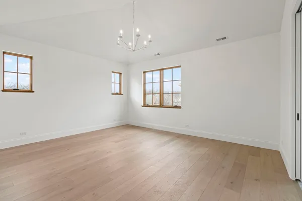 a view of an empty walk in closet