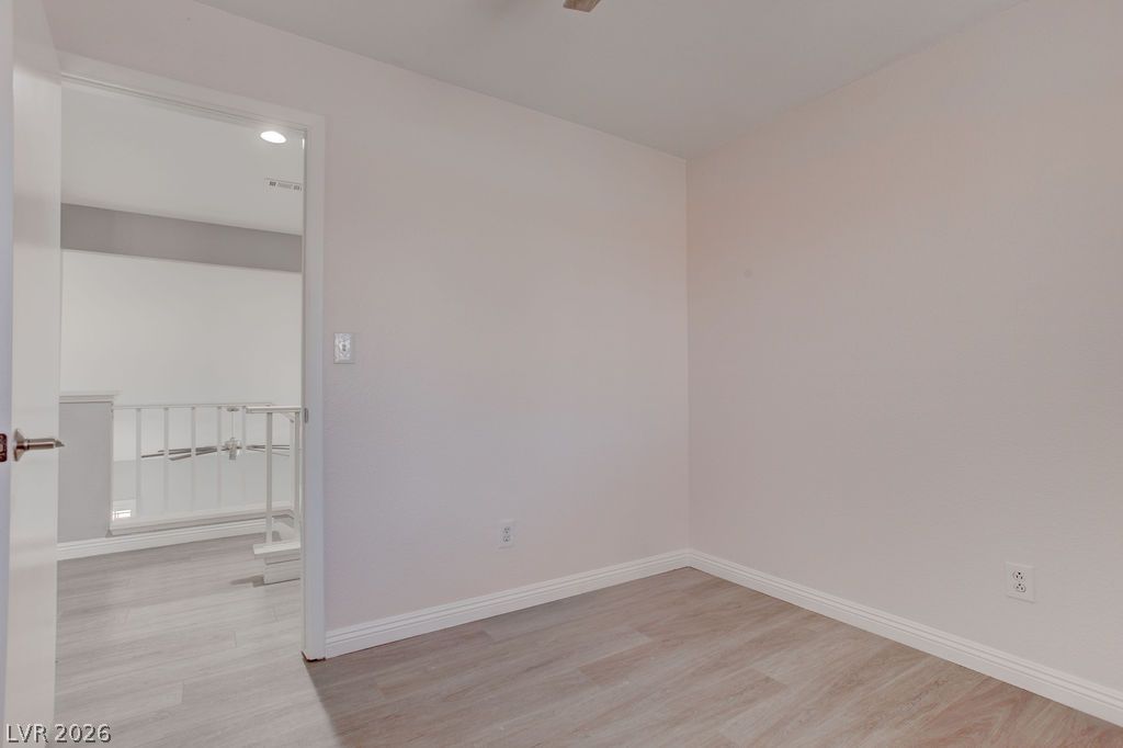 1416 Walstone Road North Las Vegas, NV 89031 - Photo 32 of 47 A versatile room featuring light-toned flooring, ready for personalization.