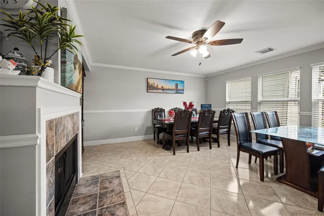 a view of dining room with furniture and a chandelier