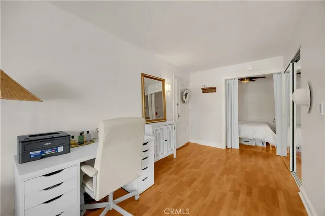 a room with a bed and a view of bedroom