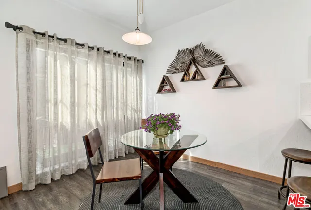 a room with a sink and a mirror